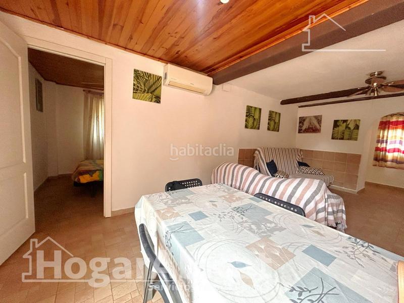 Foto cb47084b-ff9f-48c1-ae42-cd68fd3e4523. Chalet  reformado con piscina, garaje, terraza y barbacoa en Llíria