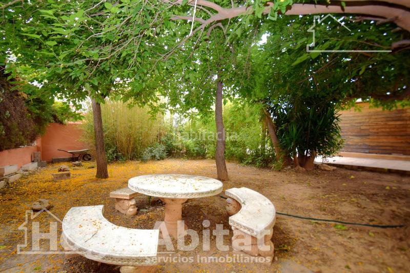 Foto f548fcc3-ef92-426c-935c-3a940afa2467. Chalet  reformado con piscina, garaje, terraza y barbacoa en Llíria