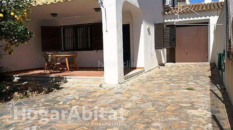Foto ddd8b5e3-1dd6-4234-8d67-09c4bd0c3d43. Casa amb calefacció aparcament a Mareny Blau Sueca