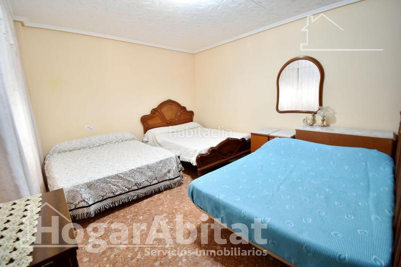 Foto 2fe4bc81-f5f0-4a9e-ace3-3ea0d0bf5e16. Casa adossada amb aparcament a Cheste