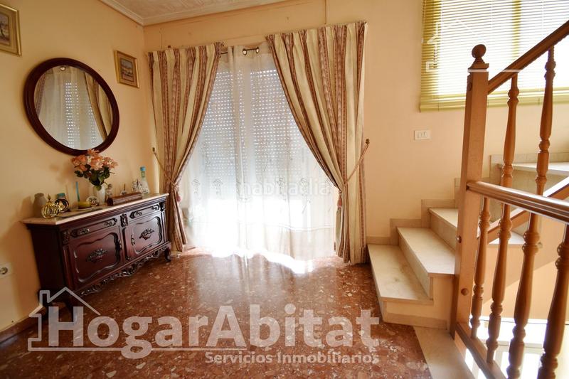 Foto 3acd9f03-bedd-42c5-a2fb-6d0108ede555. Casa adossada amb aparcament a Cheste