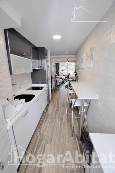 Foto adc70a86-0598-40ab-9b31-153d4c212378. Appartement avec parking piscine dans El Perellonet Valencia