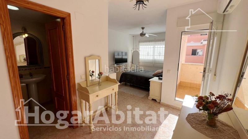 Foto c43e243c-d14c-468a-8073-a503d6d728c4. Casa adossada amb piscina a Racó Cullera