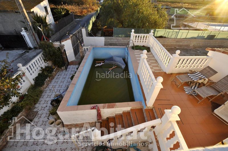 Foto 3fe4e731-b65d-413b-9176-bb609ae2bdf5. Xalet amb aparcament piscina a Corinto-Almardà Sagunt