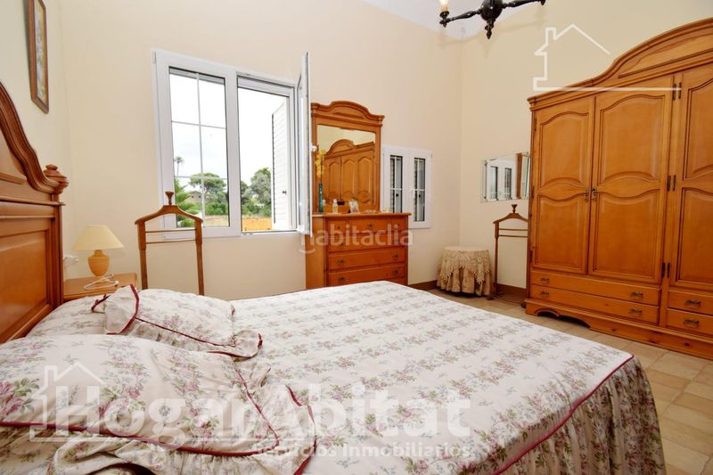 Foto 003f7177-ddb4-40e8-a448-d916bb11c5a9. Casa amb aparcament piscina a Benicull De Xúquer