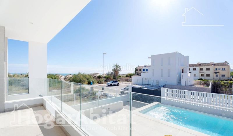 Foto 1b44af40-453d-4c54-aacb-e0b436326938. Xalet amb aparcament piscina a Oliva playa Oliva