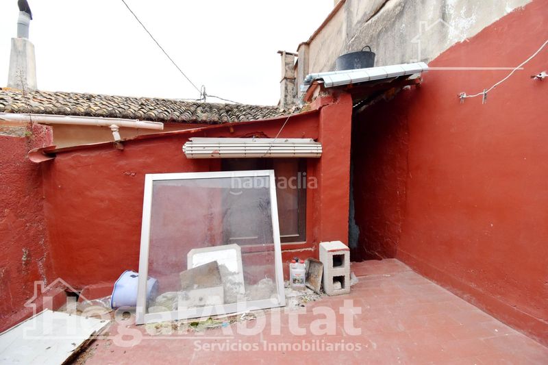 Foto ae0252d5-0159-4ea4-9833-61bf87b4050e. Casa economica! amplia casa con terraza y con muchas posibilidades en Palma de Gandía