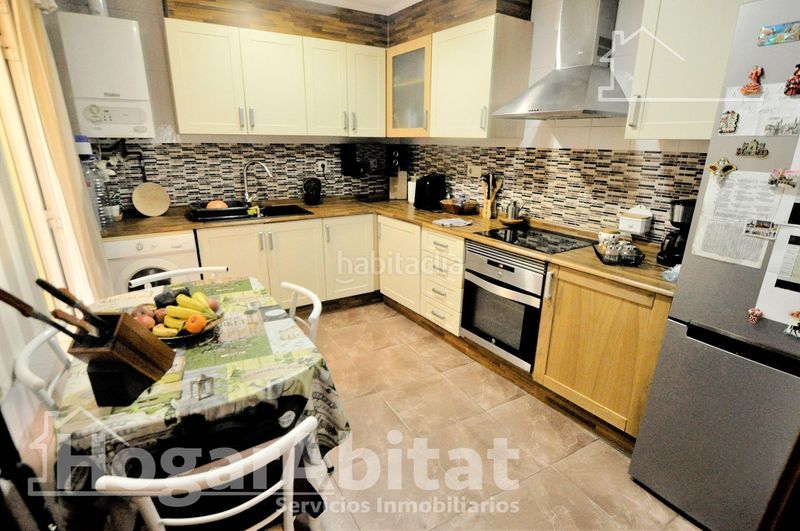 Foto 60d374cd-f94d-4de7-886e-72f54ef6bd41. Casa adossada amb aparcament a Puçol ciudad Puçol