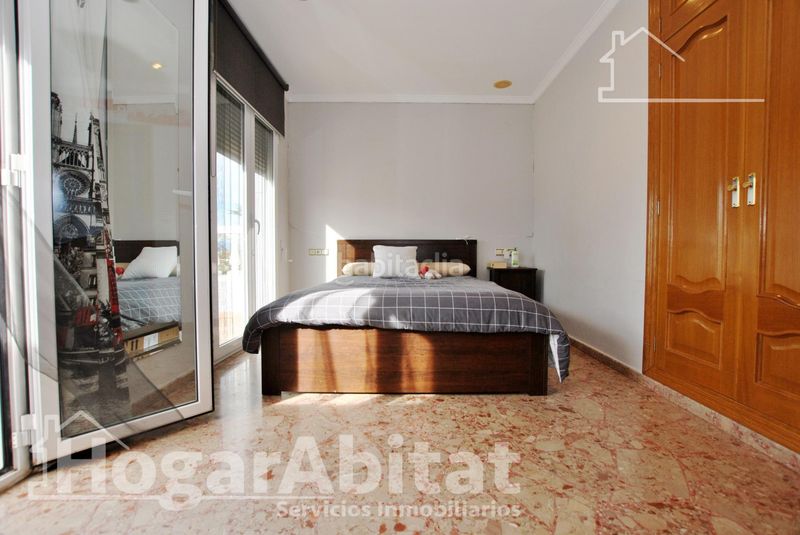 Foto 556cea9d-eea9-48d0-840e-7e9d7d58af87. Casa adossada amb piscina a Oliva playa Oliva