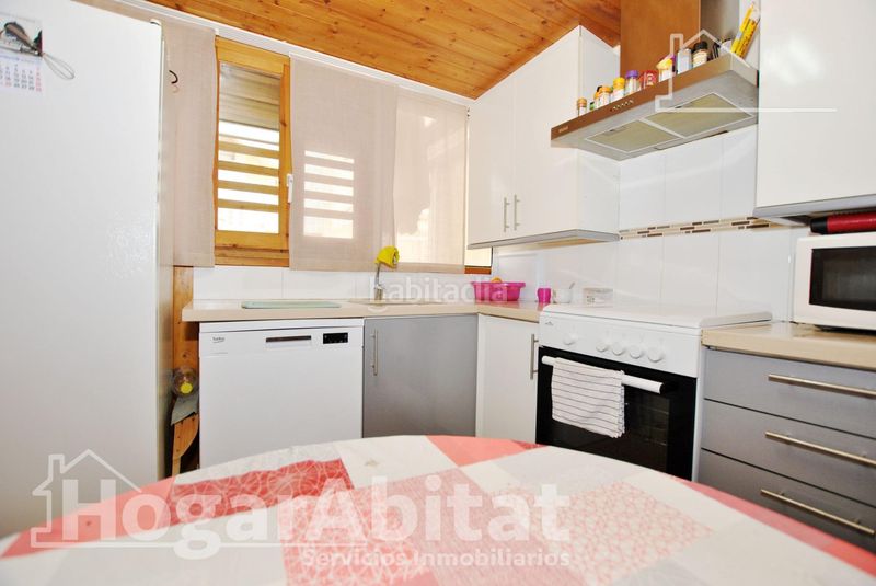 Foto 64cd90dd-6c41-4bda-ab46-5182946d7b87. Casa adossada amb piscina a Oliva playa Oliva