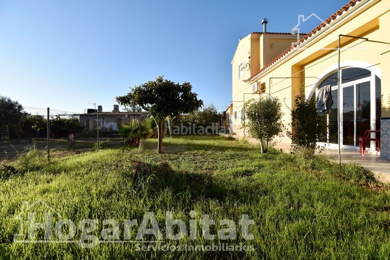 Foto 47a8d0de-8abf-4e2f-a922-3a12b237436c. Xalet amb calefacció aparcament piscina a Oliva playa Oliva