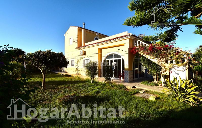 Foto 4cefad7e-8533-4ad8-b46b-7125180375fd. Xalet amb calefacció aparcament piscina a Oliva playa Oliva