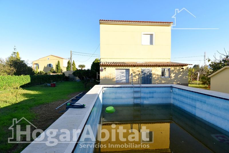 Foto a33d539e-11c7-45f5-b0aa-688e9846f353. Xalet amb calefacció aparcament piscina a Oliva playa Oliva