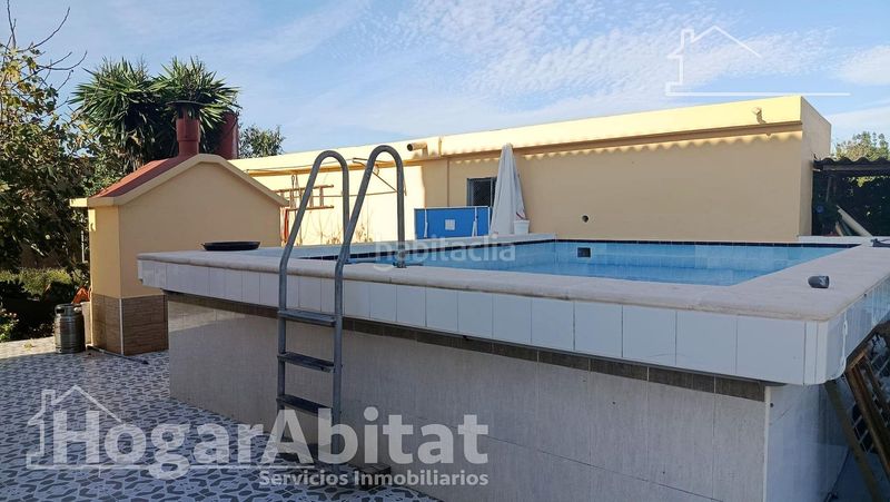 Foto f654e8b3-ae12-41e7-96db-61eec84b2e81. Xalet amb calefacció aparcament piscina a Oliva playa Oliva
