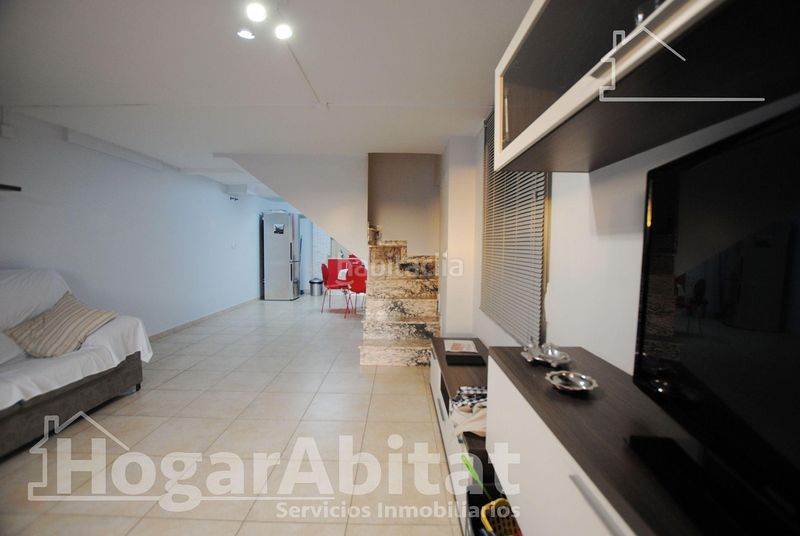 Foto 20ef626e-0ce0-4eba-81b5-fded654f4c75. Casa adossada amb aparcament piscina a Oliva playa Oliva