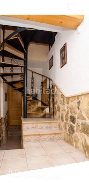 Foto b28e66bd-4a20-4e91-b0de-ca2e5507e4ef. Casa adosada adosado reformado con garaje y terraza en Muro de Alcoy