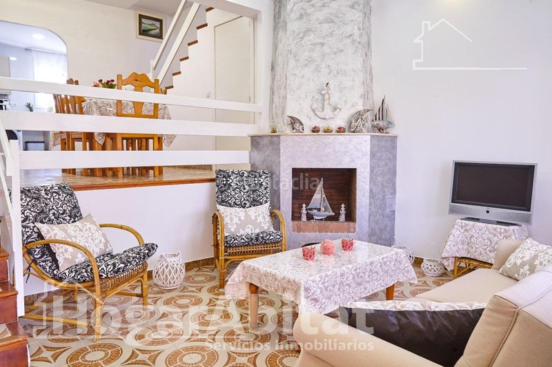 Foto a94d4dad-c721-4732-acc7-686f58234a3e. Casa adossada amb aparcament piscina a Mareny de Barraquetes Sueca