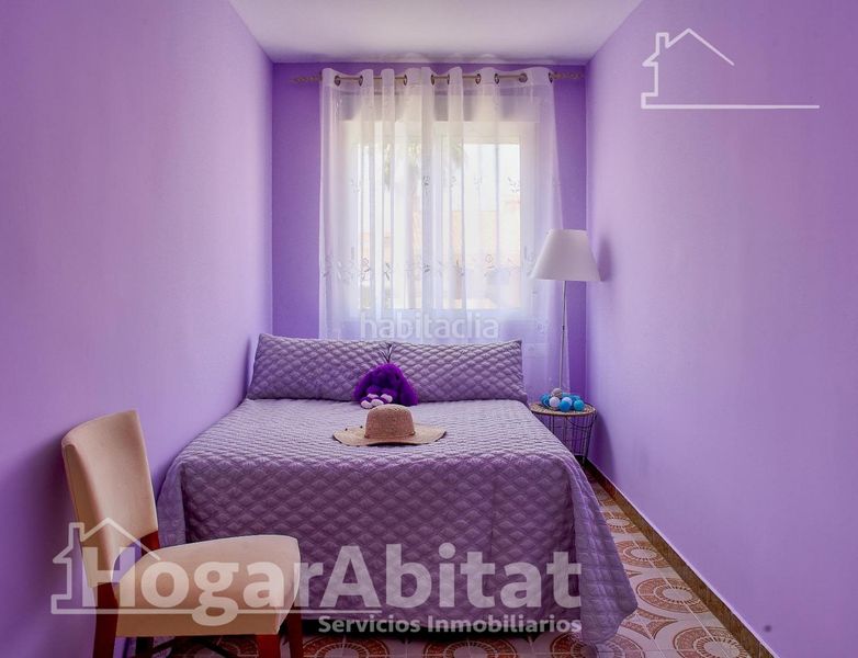 Foto fd487cb2-22a3-42e8-ac22-2b1c638f8144. Casa adossada amb aparcament piscina a Mareny de Barraquetes Sueca
