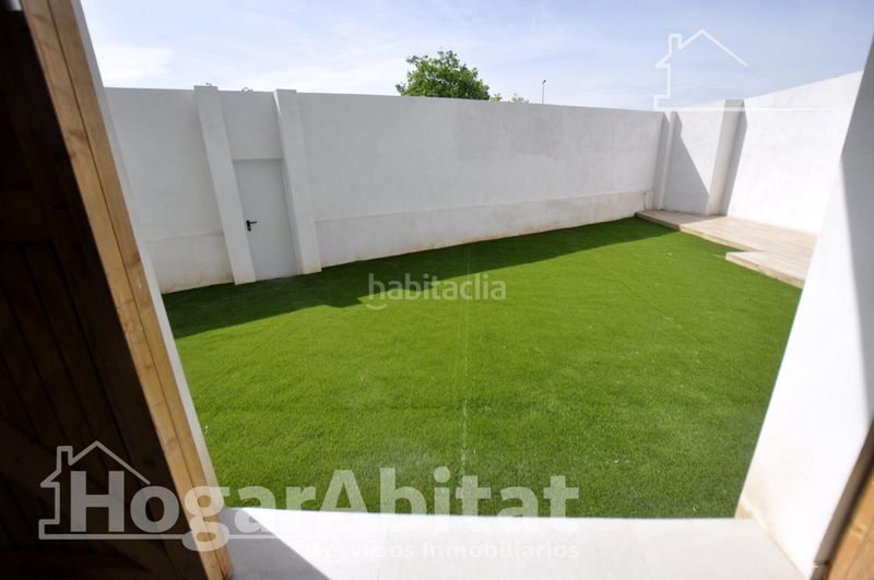 Foto 38cb1696-c7b3-4d5e-b1da-bd47d86fb0bb. Casa amb aparcament a Benimàmet Valencia