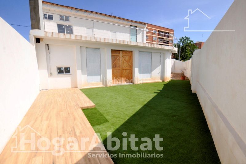 Foto 40ab30c1-cfb2-4ca4-a2ce-84046c44b255. Casa amb aparcament a Benimàmet Valencia