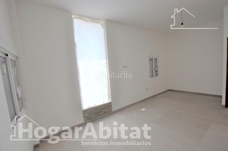 Foto 4d4bfaf1-f39d-4bd2-9299-11265bc95dfb. Casa amb aparcament a Benimàmet Valencia