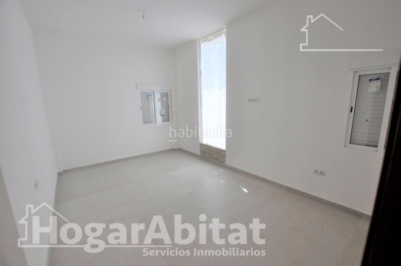 Foto c0f83ba9-179b-44bd-bd9c-9f766f38244b. Casa amb aparcament a Benimàmet Valencia