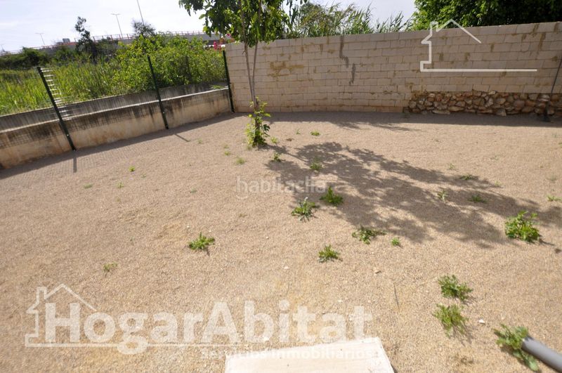 Foto ce5cb991-d3d8-4136-9aee-561c4d165ebc. Casa amb aparcament a Benimàmet Valencia
