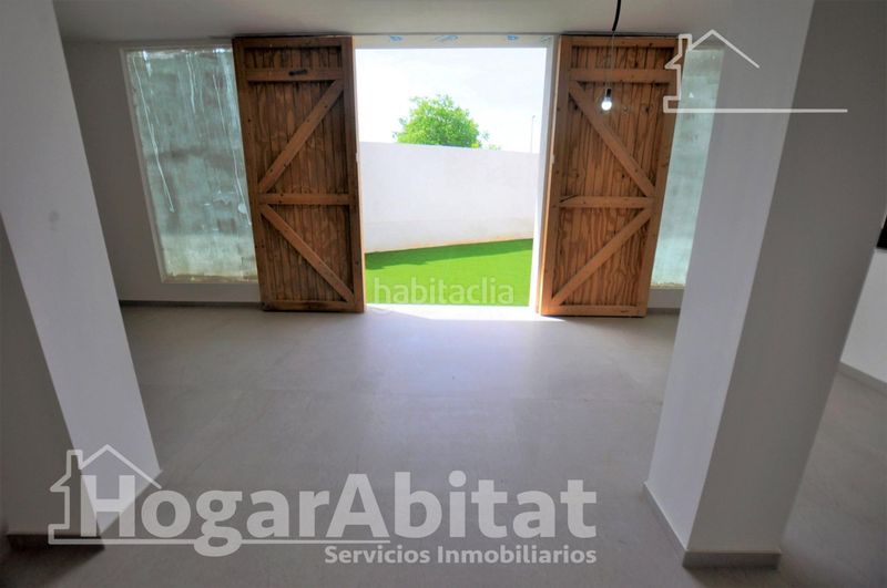 Foto e3dfc95d-0749-4cde-9d7f-80361ee55cd0. Casa amb aparcament a Benimàmet Valencia