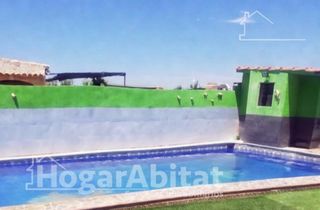 Xalet  Partida pinella. Chalet rústico con piscina, terraza y parking