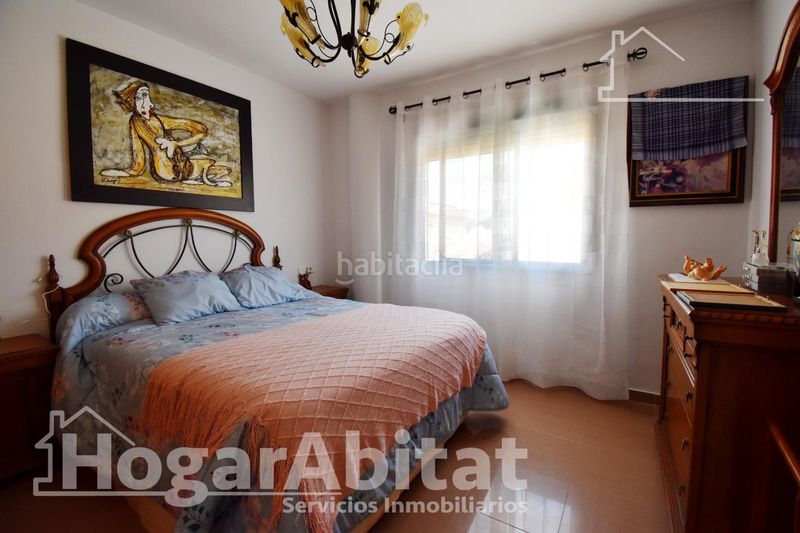 Foto e4a0c8af-8592-4d1d-8c77-3fd23639e65a. Casa adossada amb aparcament a Bellreguard