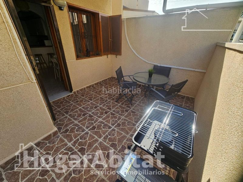 Foto 47408407-101d-4098-a70f-5527cccf1173. Casa adossada amb aparcament piscina a Playa Flamenca Orihuela