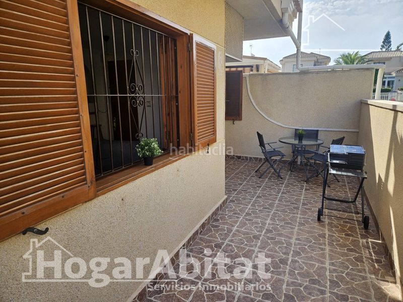 Foto b14a1e83-9890-4c9e-90c4-f5cd7bda95b9. Casa adossada amb aparcament piscina a Playa Flamenca Orihuela