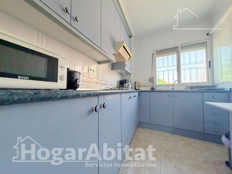 Foto b2bd7656-489b-425f-a2d9-1945379f4091. Chalet  con piscina, garaje, terraza y barbacoa en Vilamarxant
