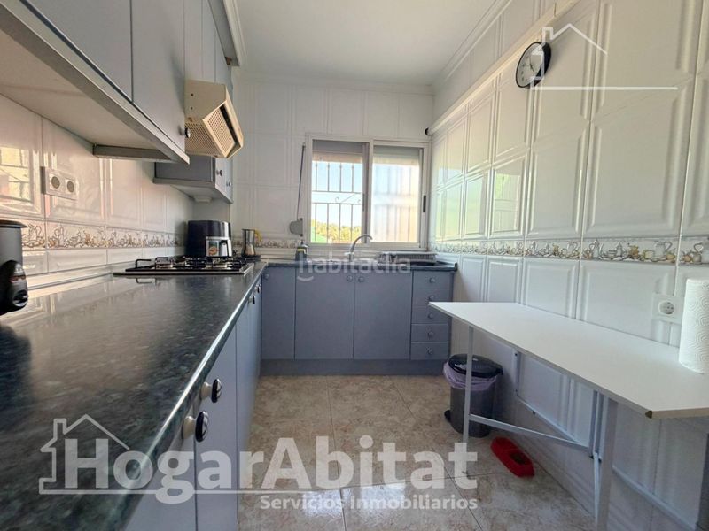 Foto d633293e-1612-43b1-8877-cc28080cb1c7. Chalet  con piscina, garaje, terraza y barbacoa en Vilamarxant