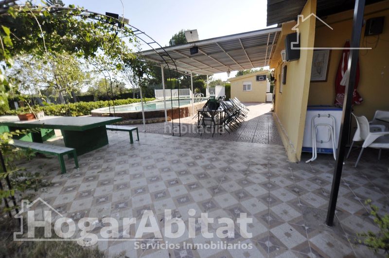 Foto 2094a0dc-ea51-4f35-824c-aaf15a17ca00. Casa amb aparcament piscina a La Conarda-Montesano Bétera