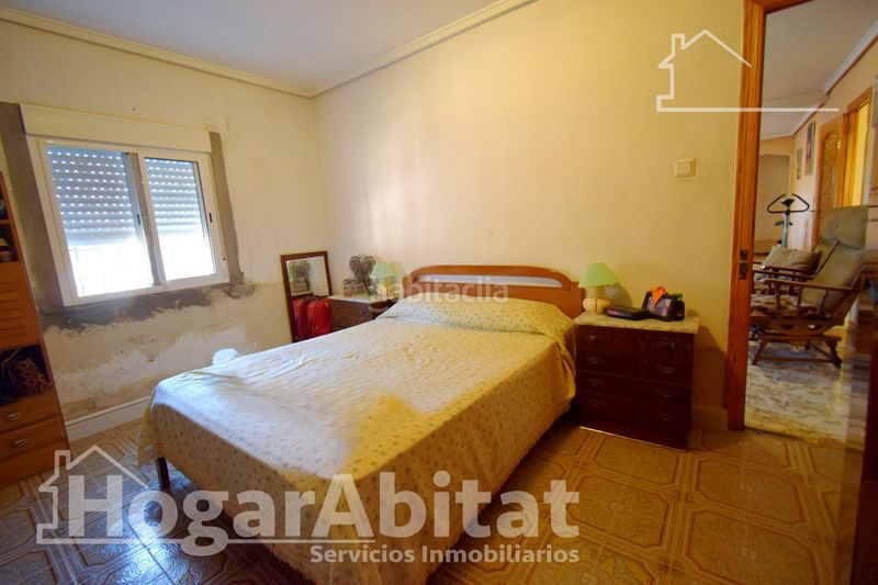 Foto 5d77ef27-7f8f-4c38-8fd3-ffbf41244ec0. Chalet  rústico con piscina, garaje y terraza en Vilamarxant