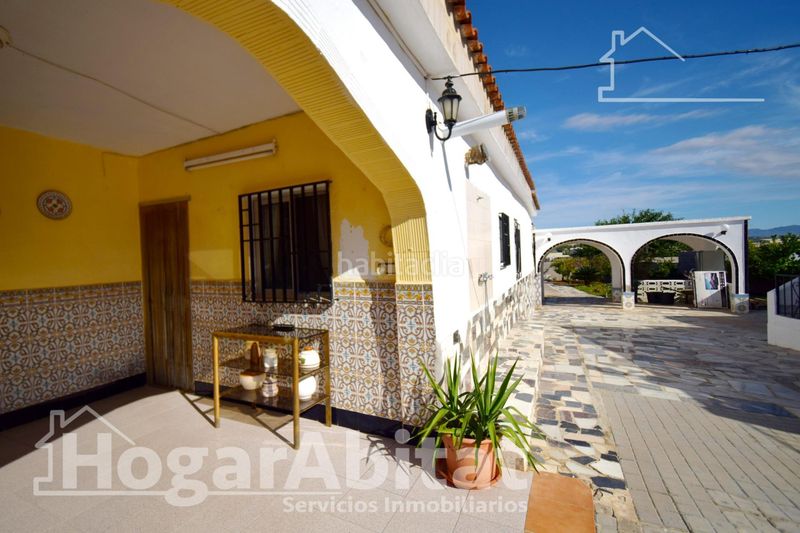Foto 8d4674ed-7046-40b3-9543-37af5a455948. Chalet  rústico con piscina, garaje y terraza en Vilamarxant