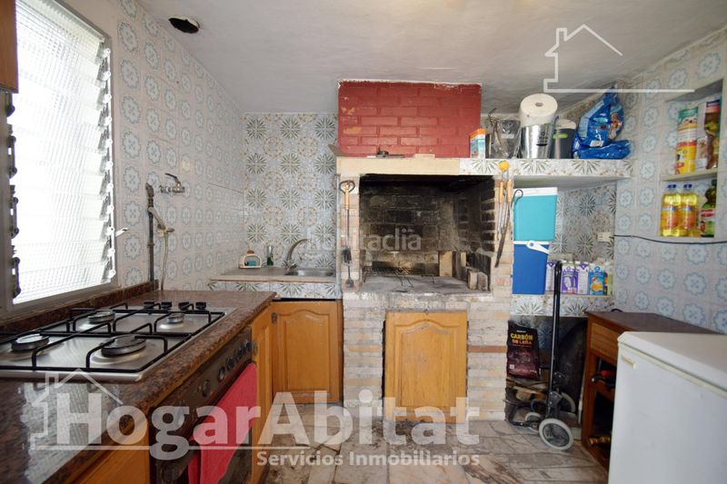 Foto bb072697-bf53-44e1-a20d-3f502daeab2f. Chalet  rústico con piscina, garaje y terraza en Vilamarxant