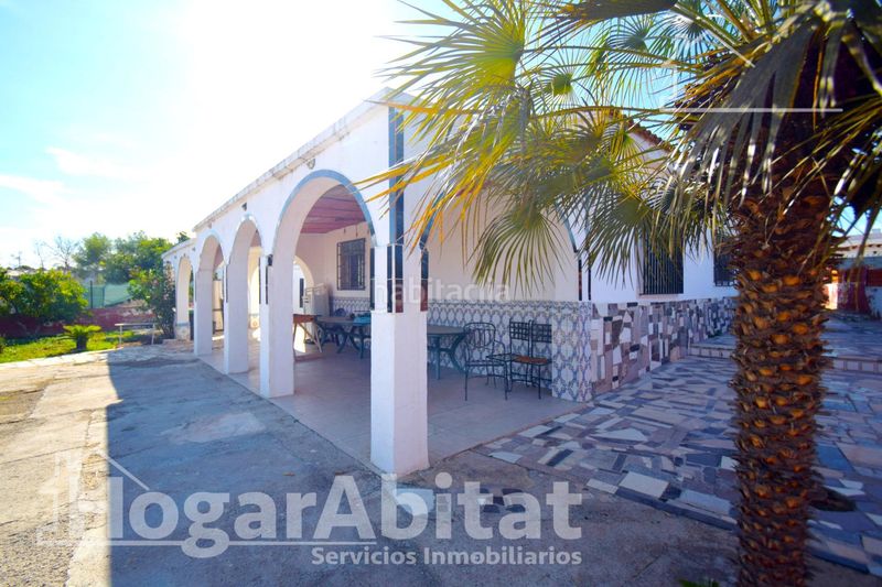 Foto ccc33de2-547e-488f-ac90-10bf7d304393. Chalet  rústico con piscina, garaje y terraza en Vilamarxant