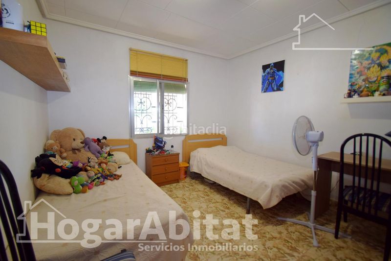 Foto d2d931b9-17aa-418d-b984-2e4afaa7c3e4. Chalet  rústico con piscina, garaje y terraza en Vilamarxant