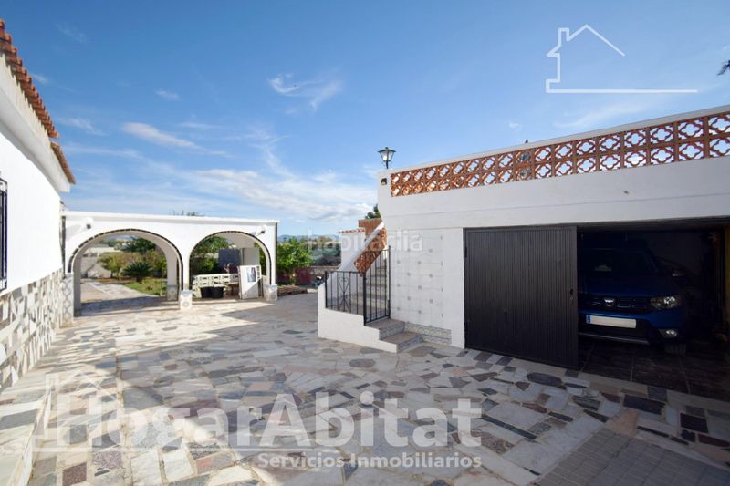 Foto e551a802-fbc1-4839-952b-4e9a9239f612. Chalet  rústico con piscina, garaje y terraza en Vilamarxant