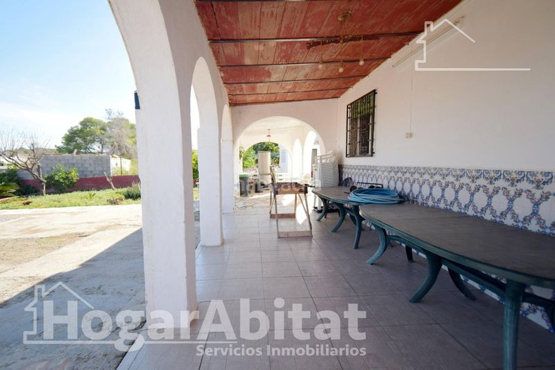 Foto ed23a3eb-e5d8-49d1-a746-da38df259f3c. Chalet  rústico con piscina, garaje y terraza en Vilamarxant