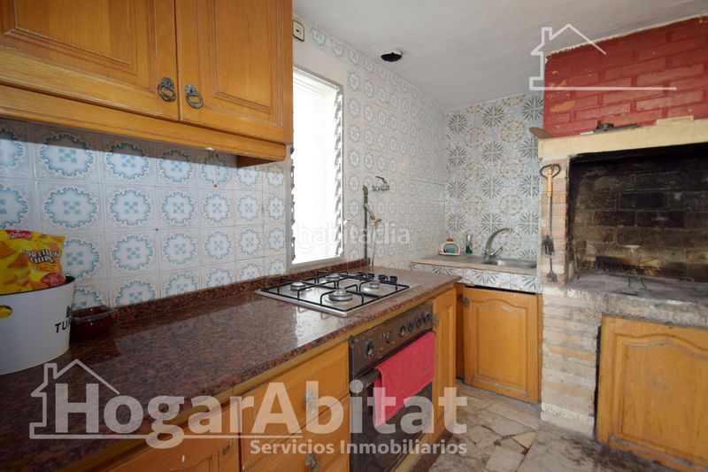 Foto ee5af103-4d2a-4496-aafe-690f5fac4510. Chalet  rústico con piscina, garaje y terraza en Vilamarxant