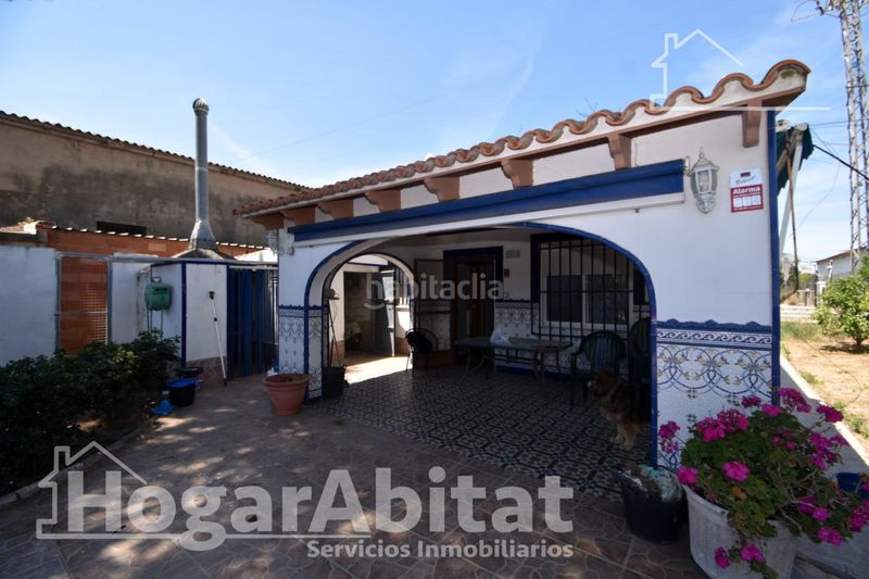 Foto 4188d55c-c630-4839-96c0-3b9b7558d489. Xalet amb aparcament piscina a Sueca Sueca