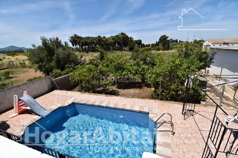 Foto d9510692-a96e-4f5a-80fe-1266ee04ed74. Xalet amb aparcament piscina a Sueca Sueca