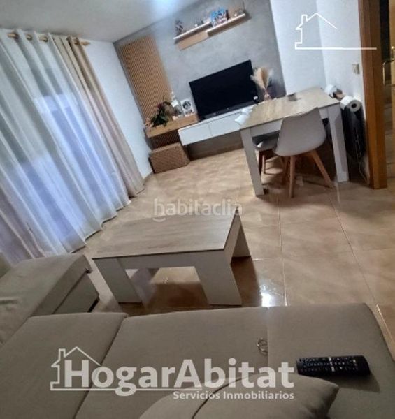 Foto d0ceaf46-f9d6-4a57-8004-7c10b749e752. Casa adossada amb aparcament piscina a Vilamarxant
