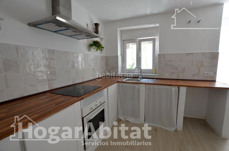 Foto 79f5c8e9-eec8-41b0-bbe6-e8ca63a77120. Casa amb piscina a Centro Mutxamel