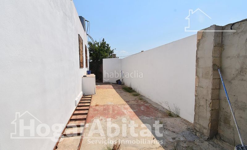 Foto 7300d4e7-681f-46c1-8084-11227fc98b80. Xalet amb aparcament piscina a Sueca Sueca