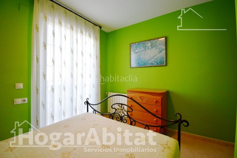 Foto 4869fa8c-ac0f-4dff-b984-3f490ba5f525. Casa adossada amb calefacció aparcament piscina a Cullera