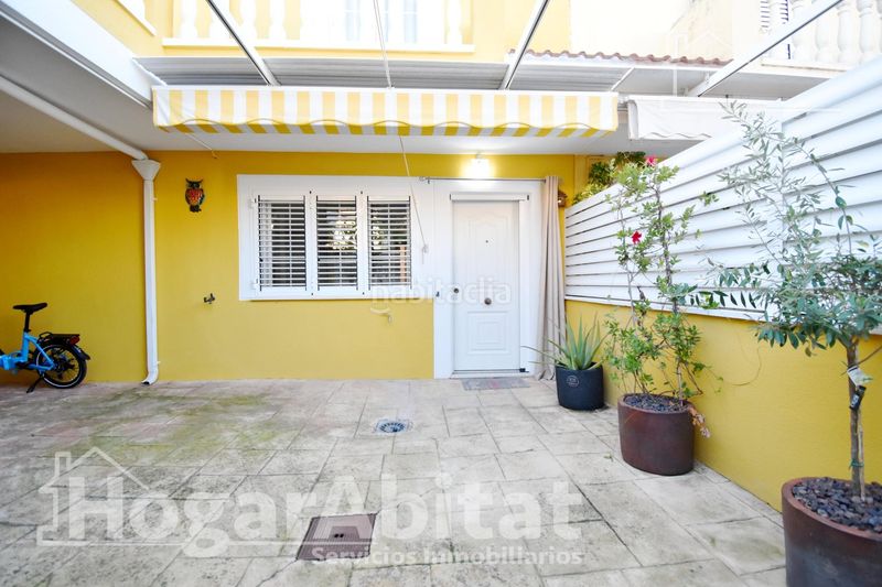 Foto 82d3b65e-2874-4789-95fe-1f4a08d288ee. Casa adossada amb calefacció aparcament piscina a Cullera